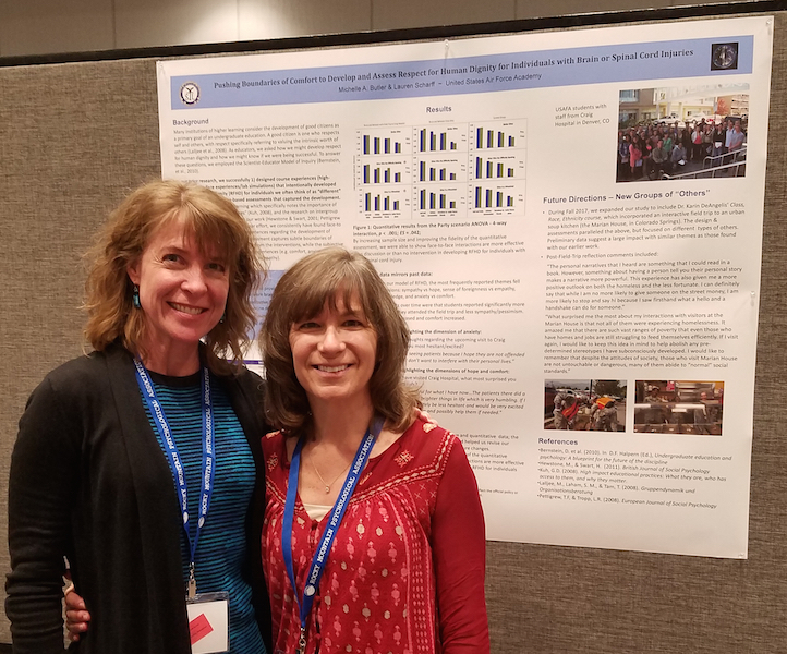 Lauren and
                Michelle at RMPA poster 2018